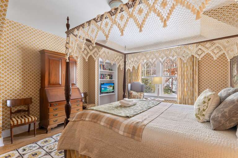 Queen Canopy Bed and TV