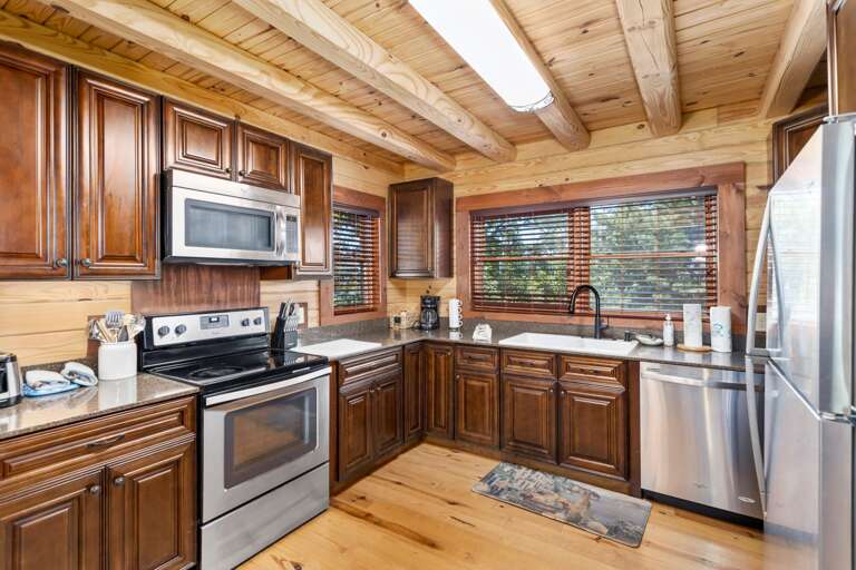 Spacious Warm Kitchen with Stainless Appliances