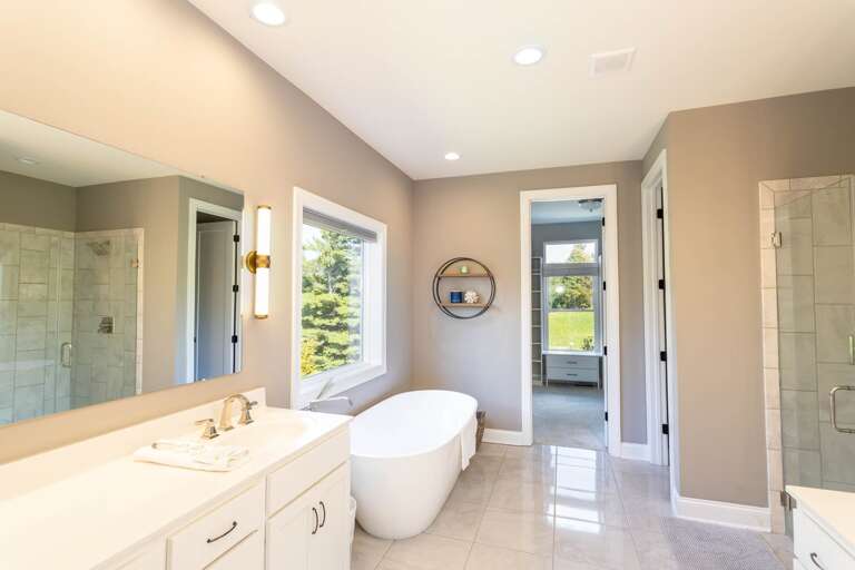 Master Bathroom with Soaking Tub and Tiled Shower