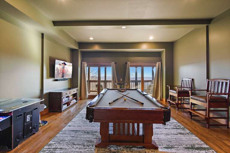 Pool Table, Seating, Arcade Game, Large Screen TV and Lower Level Deck