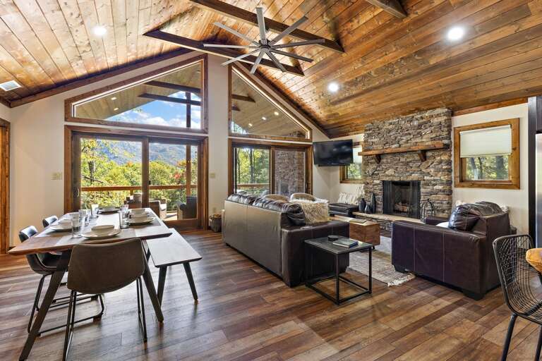 Vaulted Ceilings, Stacked Stone Fireplace and Floor to Ceiling Windows