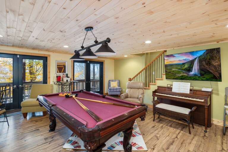 Pool Table, Piano and Large TV in the Game Room with Seating