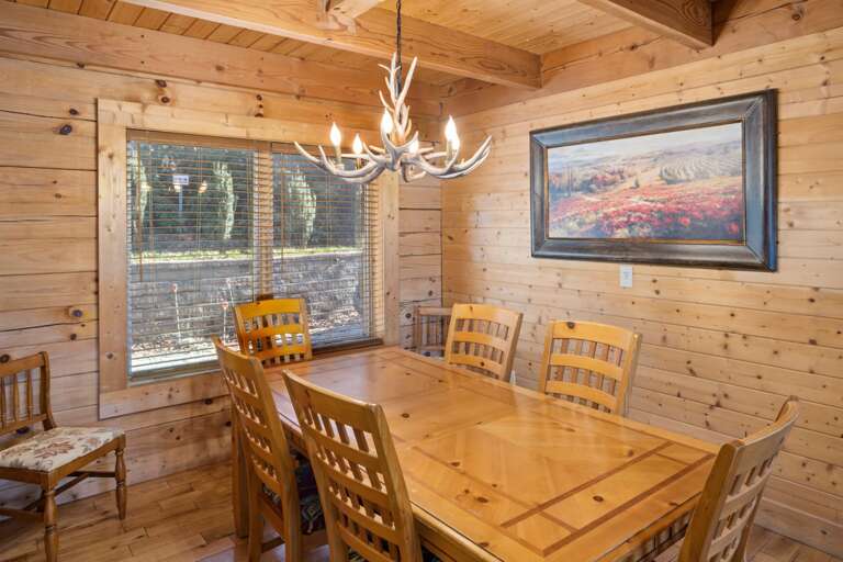 Dining Table and Adjacent Kitchen Bar Seat Twelve