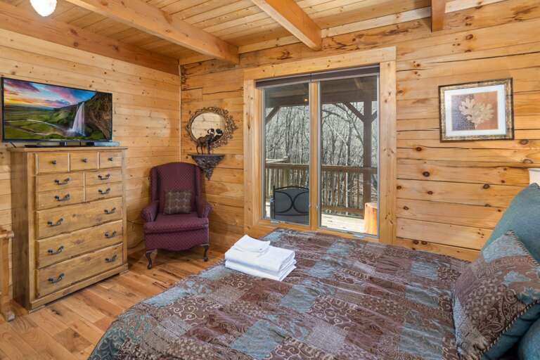 TV and Deck Access in the Queen Bedroom
