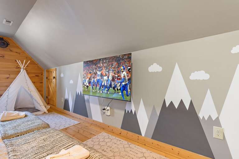 Big TV and Mountain Mural in the Kids Kamp Bedroom Big TV and Mountain Mural in the Kids Kamp Bedroom