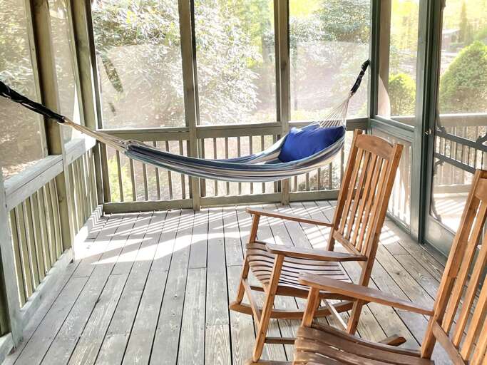 Hammock and Rocking Chairs in the Screened Porch with Nature Views Hammock and Rocking Chairs in the Screened Porch with Nature Views