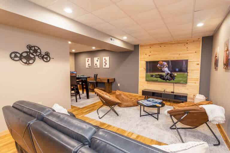 Lower Level Family Room with TV and Lots of Game Tables Lower Level Family Room with TV and Lots of Game Tables