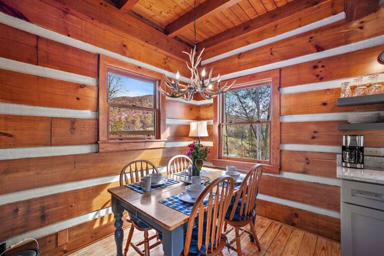 Dining Table Seats Six with Additional Chairs Provided.