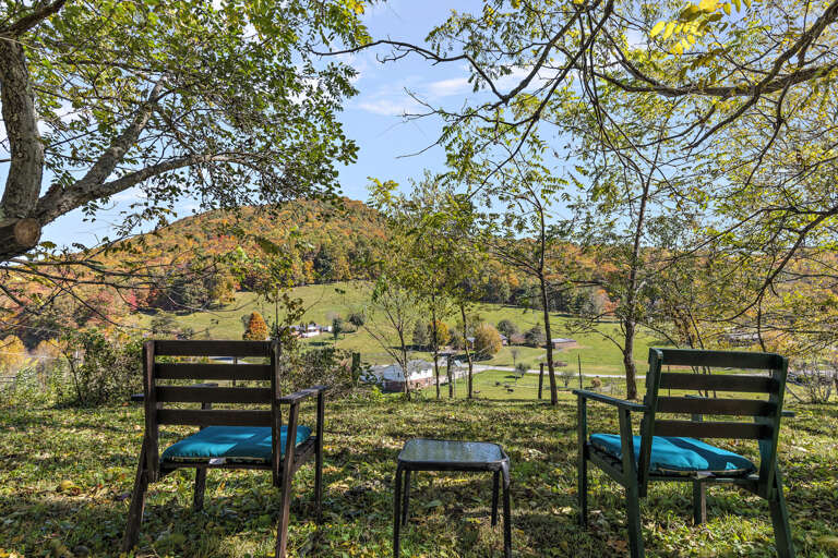 Lawn Chairs and Table for Taking in the Serene Setting