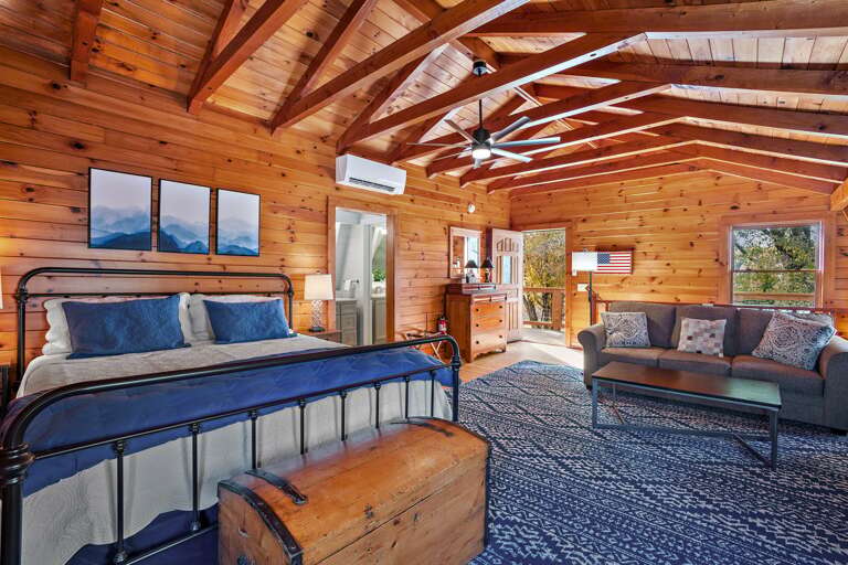 Upstairs Bedroom with a Balcony