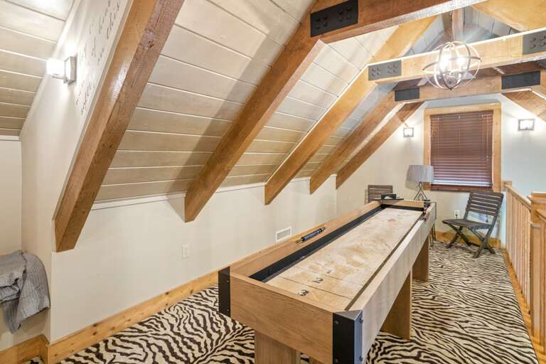 Shuffleboard Game Table in the Loft Shuffleboard Game Table in the Loft