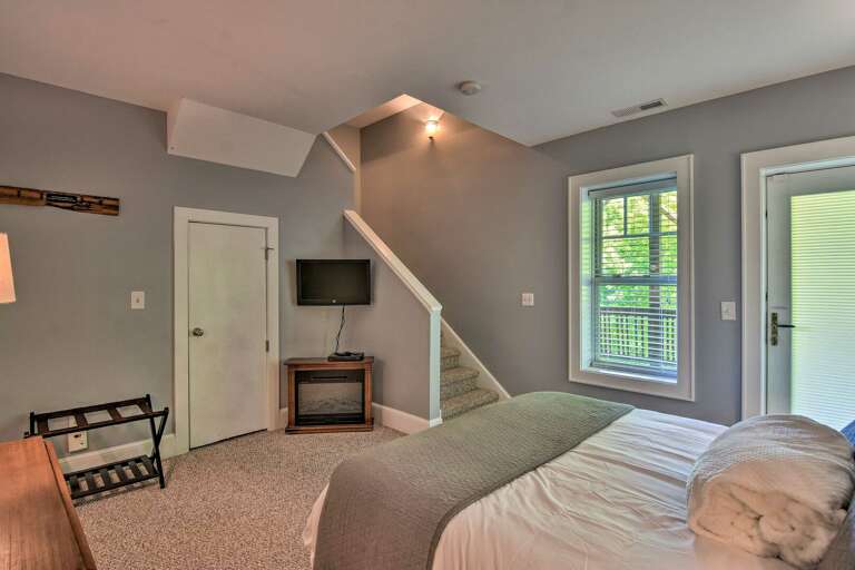 Entire Lower Level is a Queen Bedroom with a Balcony Entire Lower Level is a Queen Bedroom with a Balcony