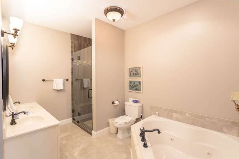 Private Ensuite Master Bathroom with Jetted Tub and Separate Shower