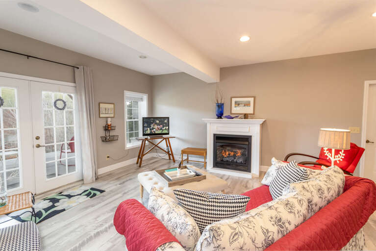 TV and Gas Log Fireplace in the Family Room
