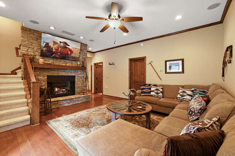 Lower Level with Large Flat Screen, Gas Fireplace and Sectional Sofa with Pull Out Sleeping Space