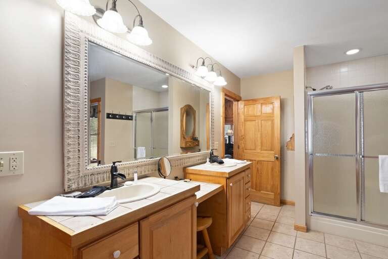 Double Vanities and Step-In Shower in the Master Bath