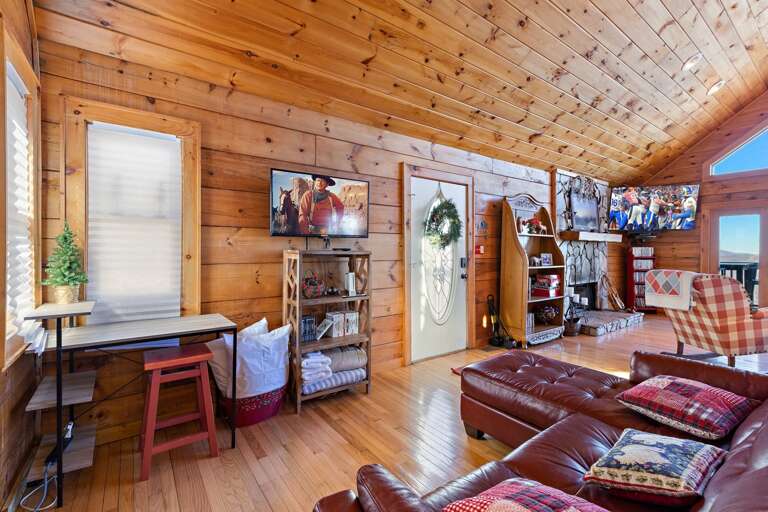 Additional TV in the Main Floor Den Area with Queen Size Sleeper Sofa