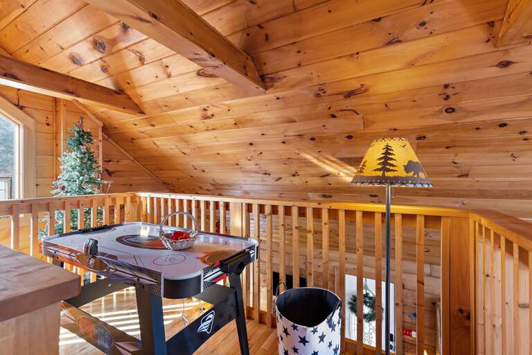 Loft with Mini Air Hockey Game Table