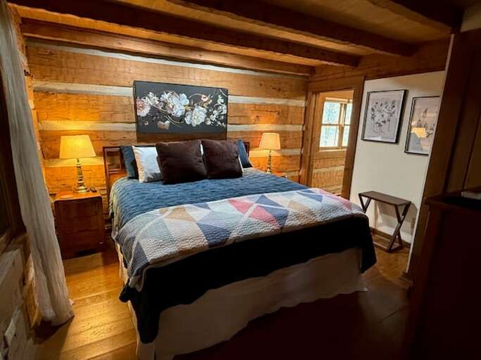 King Bed and Ensuite Bathroom in the Main Floor Master Bedroom