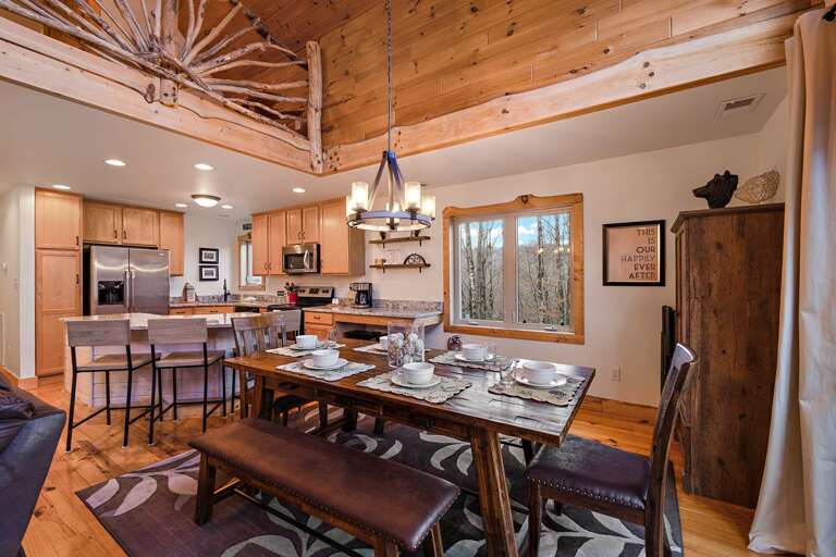 Dining Table, Kitchen Island, and Kitchen Bar with Seating for All Eleven Guests