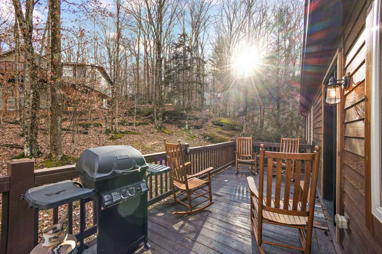 Main Level Deck with Gas Grill and Rocking Chairs