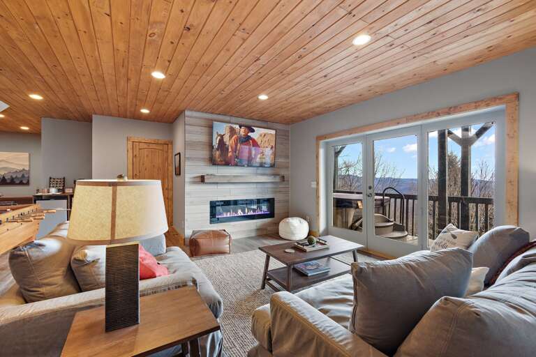Electric Fireplace, Large Screen TV and Deck with a Hot Tub