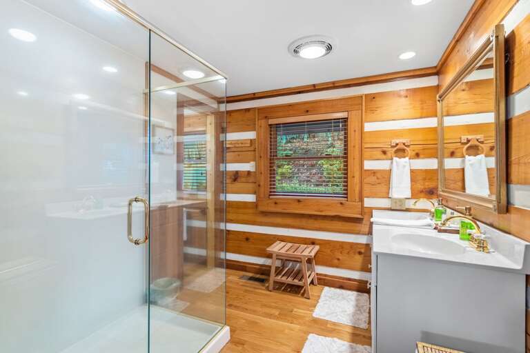 Master Bathroom with Glass Door Step in Shower