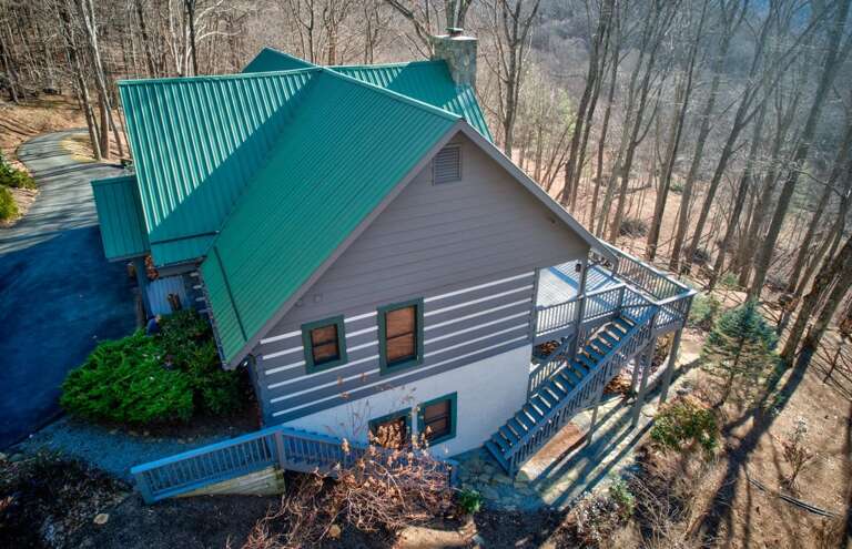 Paved Driveway and Flights of Stairs from the Front and Back Deck