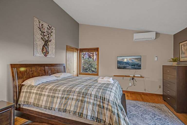 Main Floor Queen Bedroom TV and Deck Access