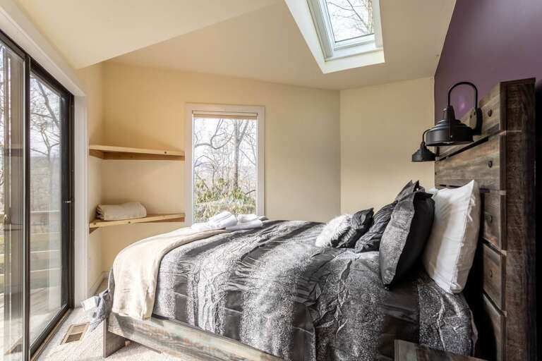 Queen Bedroom on the Main Floor with Deck Access