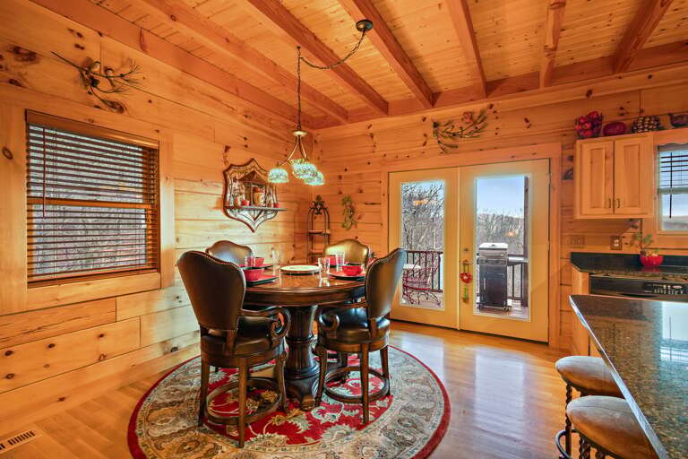 Dining Table Seats Four with Four Seats at the Kitchen Bar