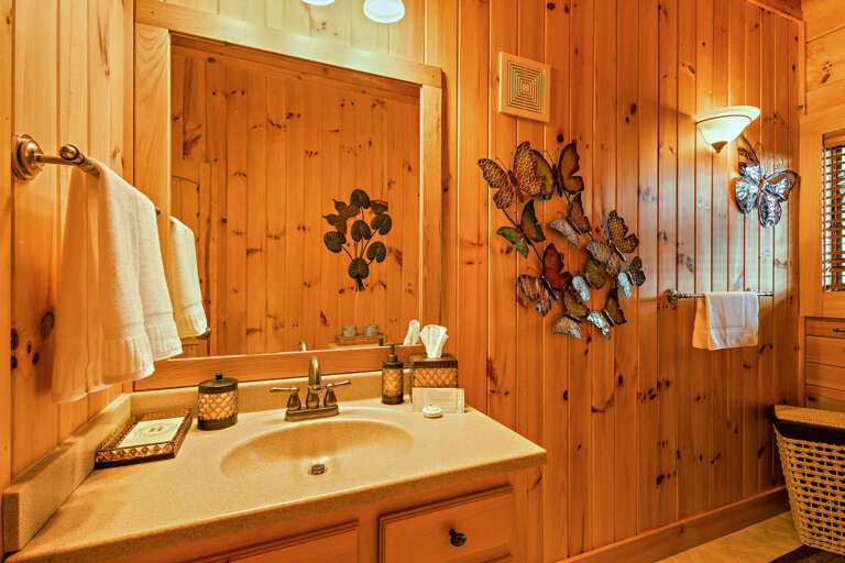 Main Floor Full Shared Bathroom has a Tub and Shower Combo