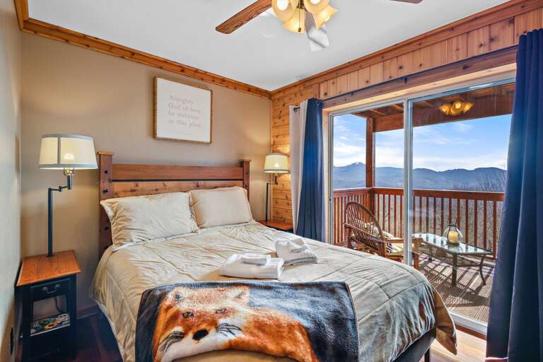 Lower Level Bedroom with a Queen Bed and In-Room Deck Access
