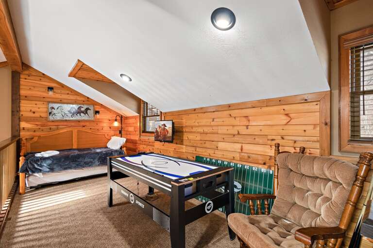 Loft Above the Living Room with Twin Bed, Twin Trundle and Air Hockey