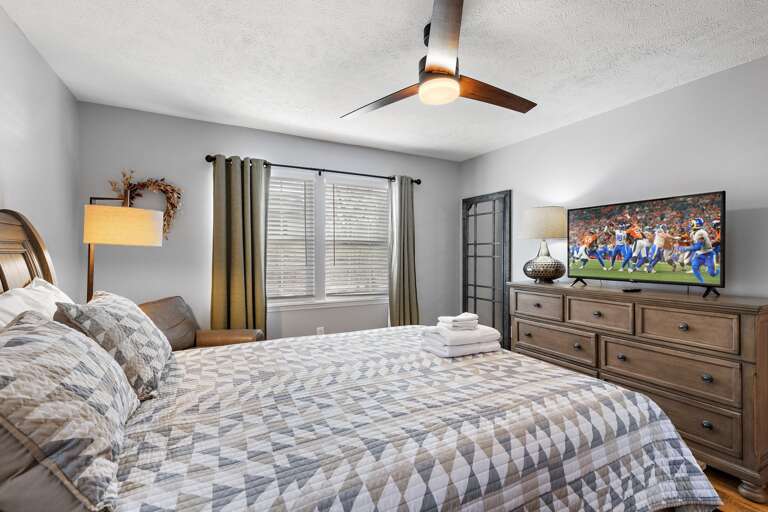 Comfortable Master Bedroom with TV and Ensuite Bathroom