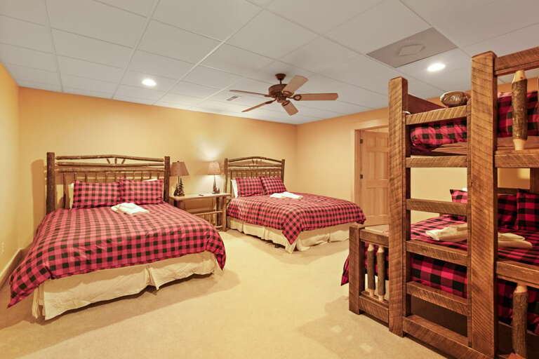 Lower Level Bedroom with a King, Queen and Twin over Double Bunk