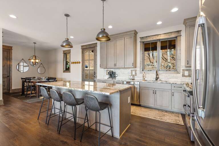 Dining Area and Bar Seating for a Full House Dining Area and Bar Seating for a Full House