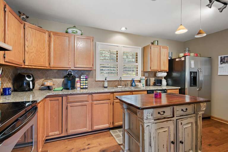 Kitchen with Ample Cabinet Space and an Island for Extra Prep Space
