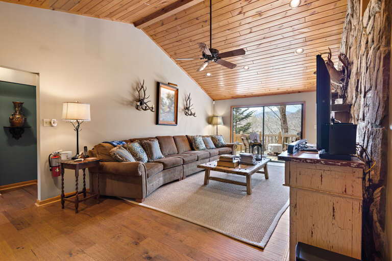 Living Room with Vaulted Tongue and Groove Ceilings