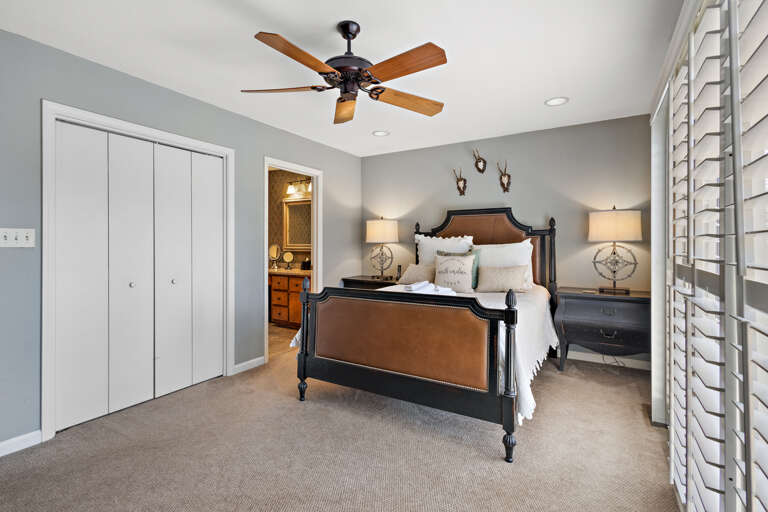 Main Level Master Bedroom with Queen Bed and Ensuite Bathroom