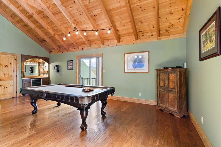 Pool Table and Wet Bar and Juliette Balcony in Second Floor Family Room Pool Table and Wet Bar and Juliette Balcony in Second Floor Family Room