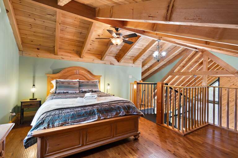 Queen Bed in Crow's Nest Accessed via Spiral Staircase Queen Bed in Crow's Nest Accessed via Spiral Staircase