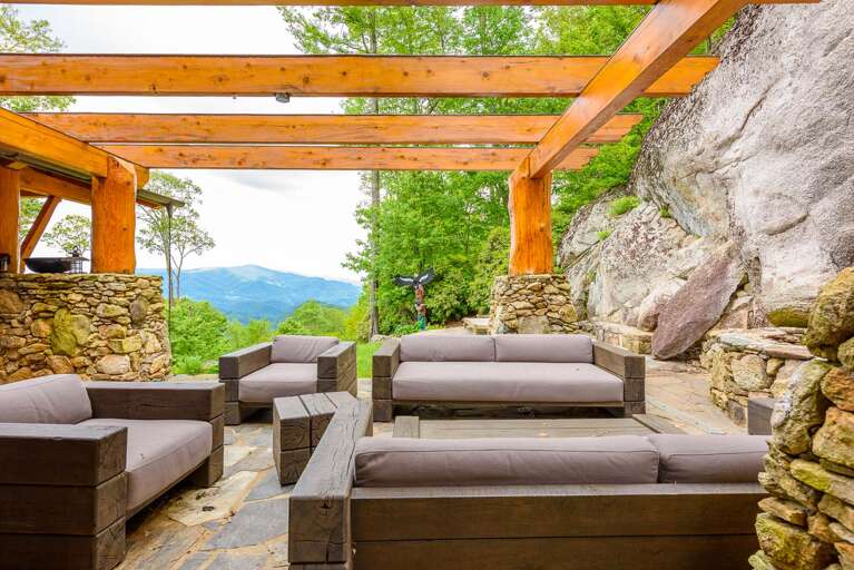 Comfortable seating on stone patio at the Rock