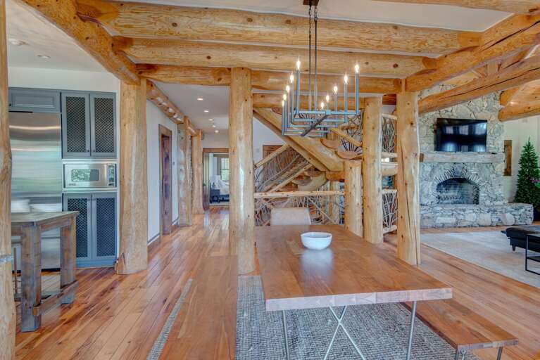 Exposed Timber Beams and Custom Wood Details Througout