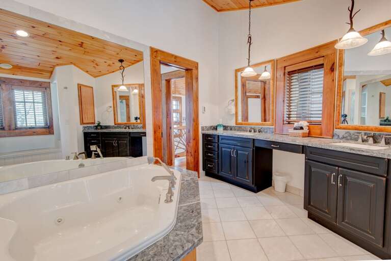 Huge Jetted Tub and Dual Vanities in the Private Bathroom