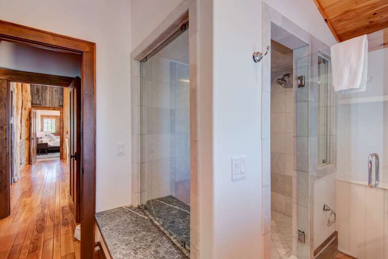 Large Tiled Shower In the Upper Level Bathroom