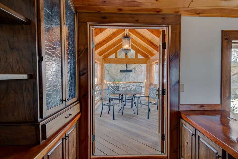 Outdoor Table and Chairs on the Upper Level Covered Balcony
