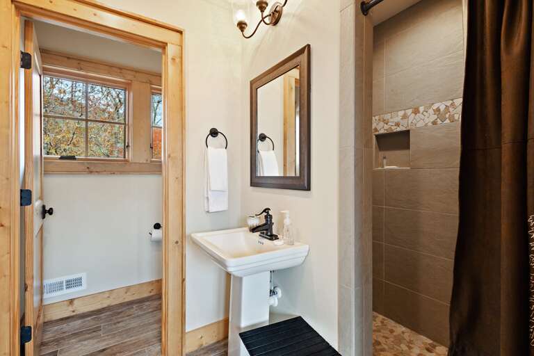 Upper Level Bathroom with Large Stone Shower