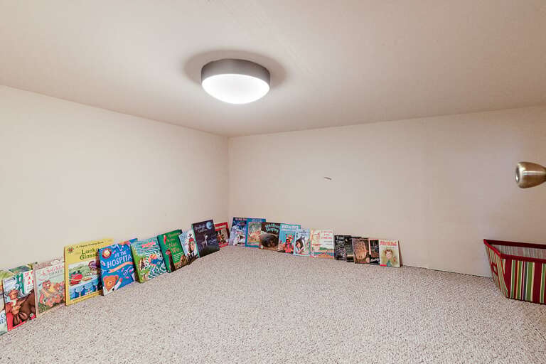 Cozy Nook Under the Stairs for Kids to Read or Play a Game