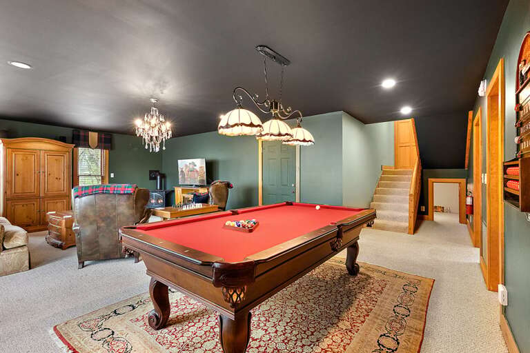 Lower Level Den with Billiards Table, Sitting Room, and Kid's Clubhouse